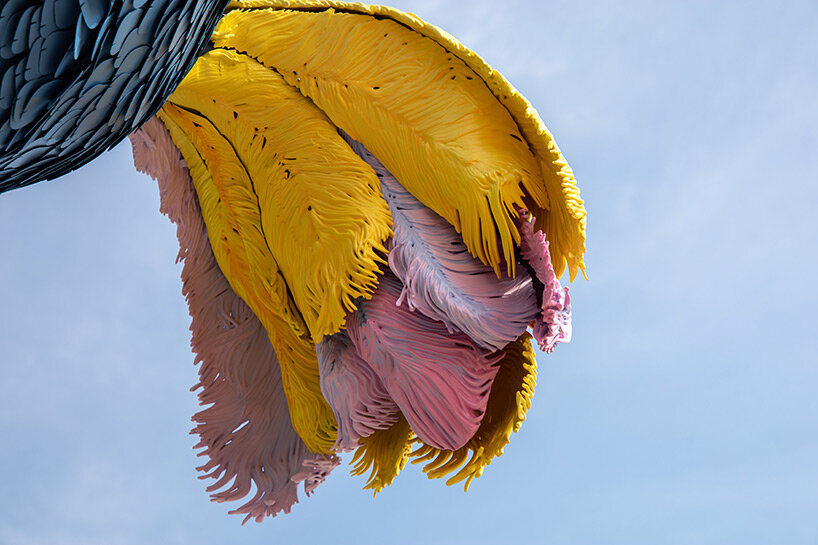 overlooking new york city, big bird rests on the moon in alex da corte's whimsical kinetic work on the met's roof garden