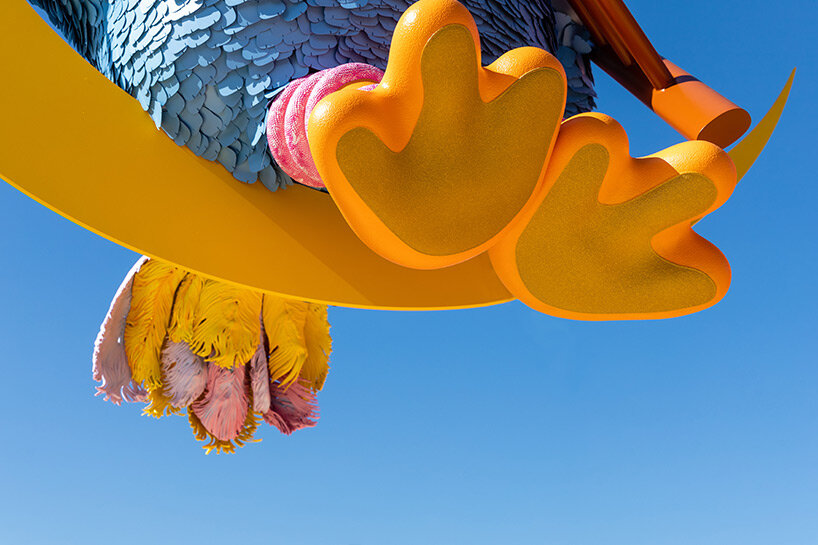 overlooking new york city, big bird rests on the moon in alex da corte's whimsical kinetic work on the met's roof garden