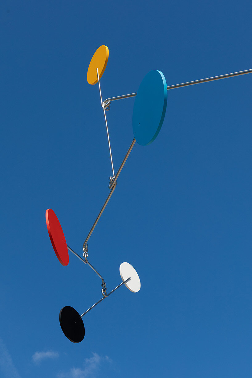 overlooking new york city, big bird rests on the moon in alex da corte's whimsical kinetic work on the met's roof garden