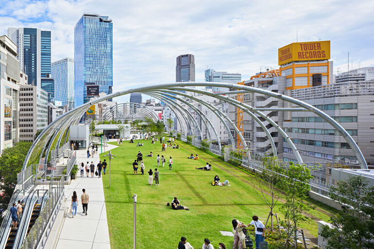 NIKKEN SEKKEI Encloses Its Miyashita Park In A Set Of Green Arches