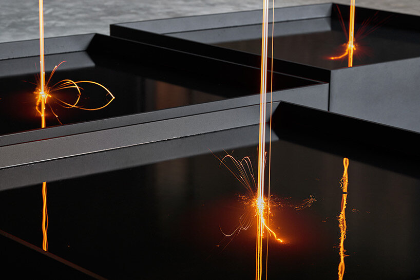 molten steel whistles through the water at the malta pavilion for the 2022 venice art biennale
