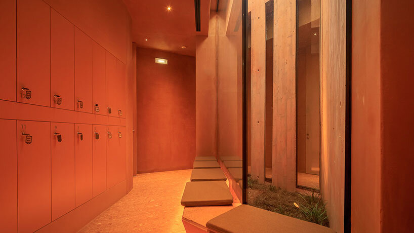 RCR arquitectes' palmares clubhouse in algarve suggests tectonic plates of red concrete