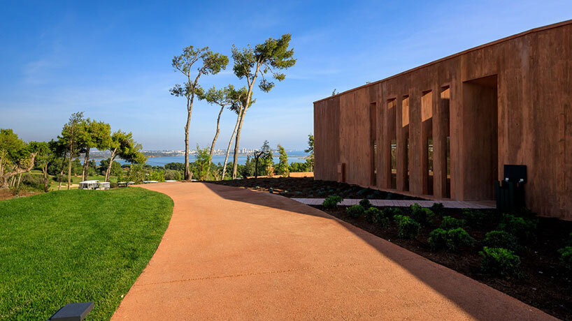 RCR arquitectes' palmares clubhouse in algarve suggests tectonic plates of red concrete