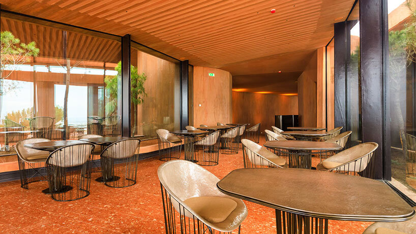 RCR arquitectes' palmares clubhouse in algarve suggests tectonic plates of red concrete