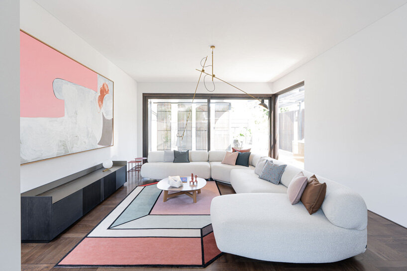 state of kin wraps 'shutter house' in timber batten skin in western australia