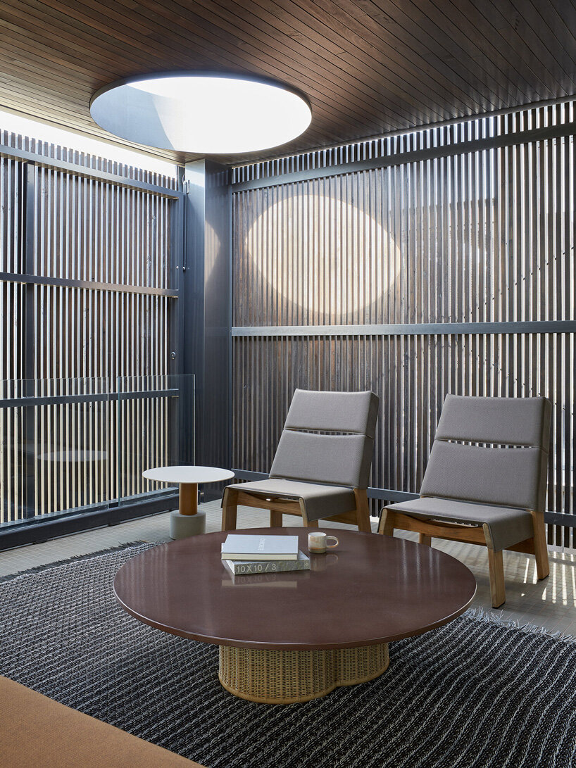 state of kin wraps 'shutter house' in timber batten skin in western australia