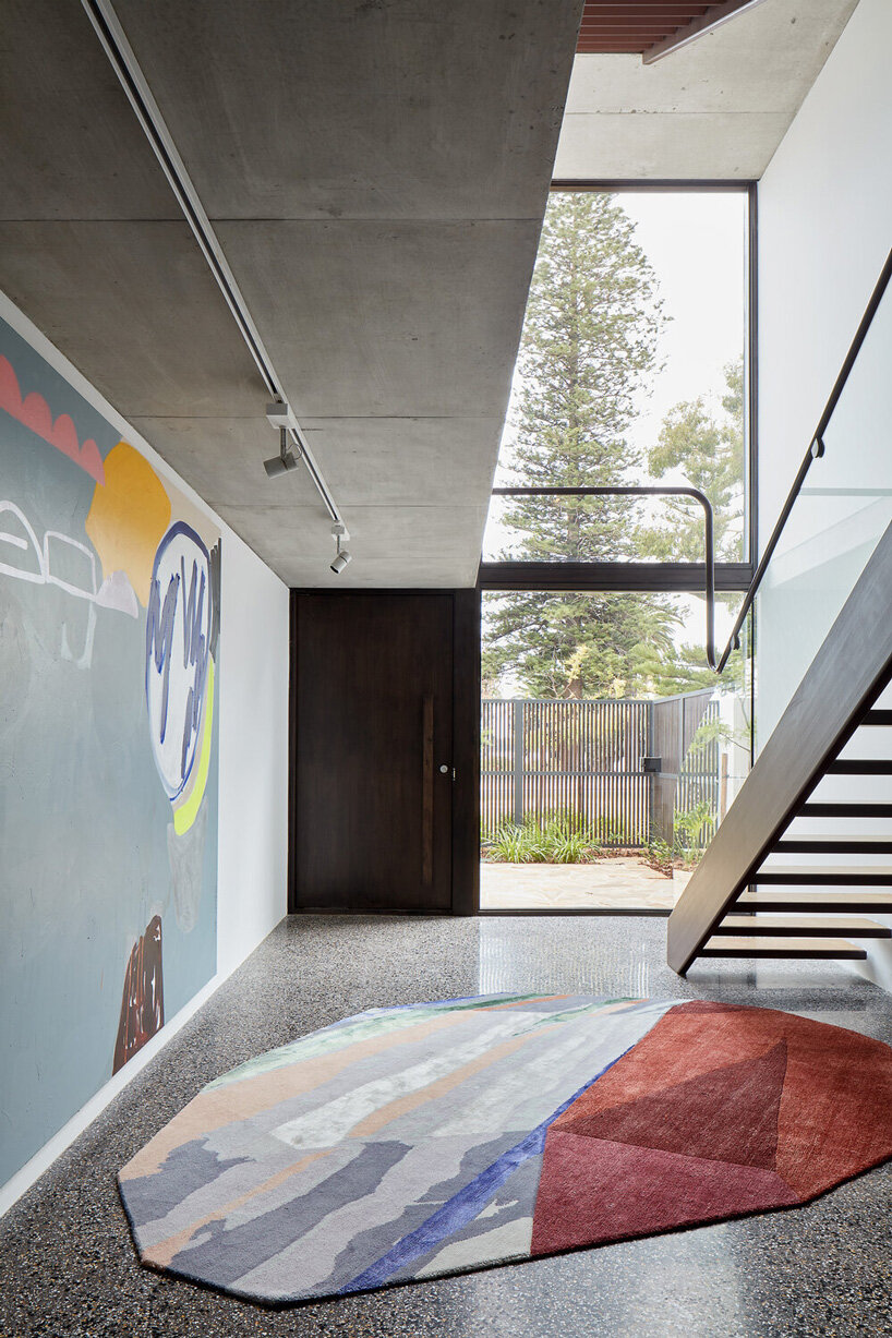 state of kin wraps 'shutter house' in timber batten skin in western australia