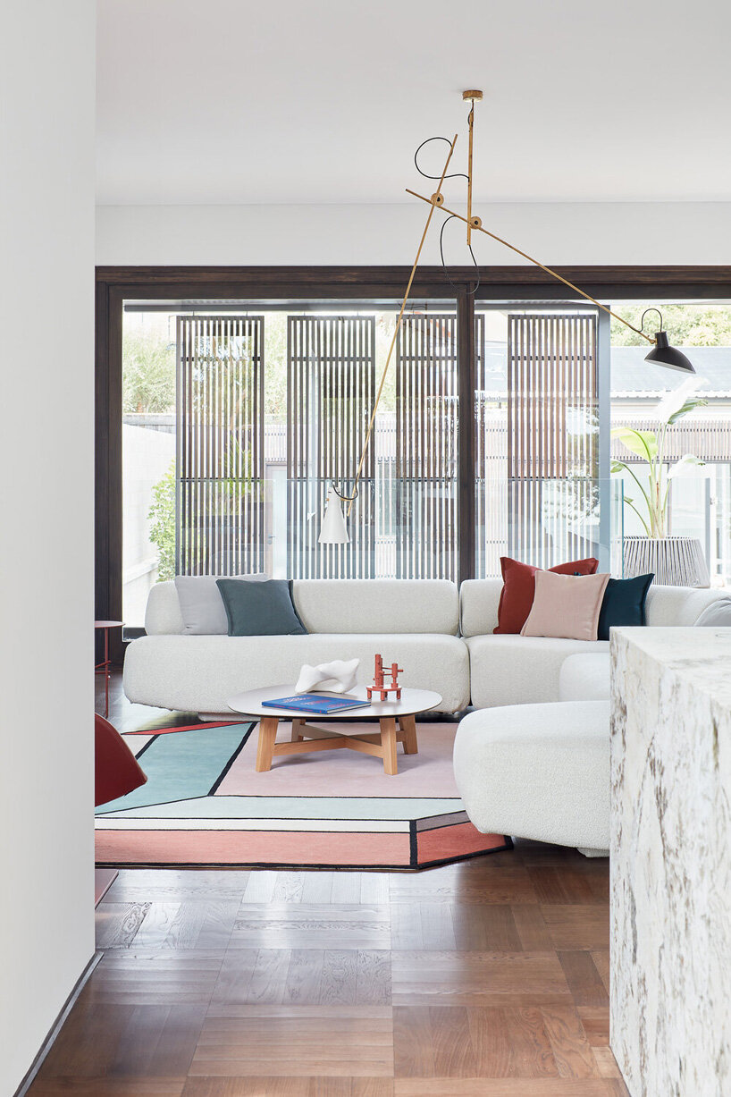 state of kin wraps 'shutter house' in timber batten skin in western australia