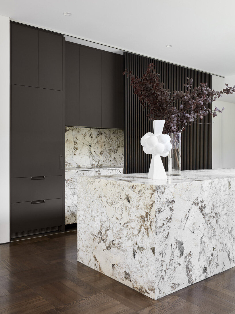 state of kin wraps 'shutter house' in timber batten skin in western australia