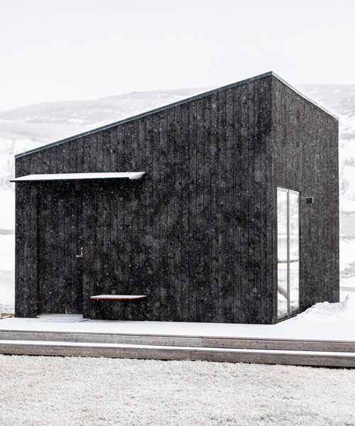 studio heima clads 21 sqm 'aska' cabin in northern iceland with charred wood