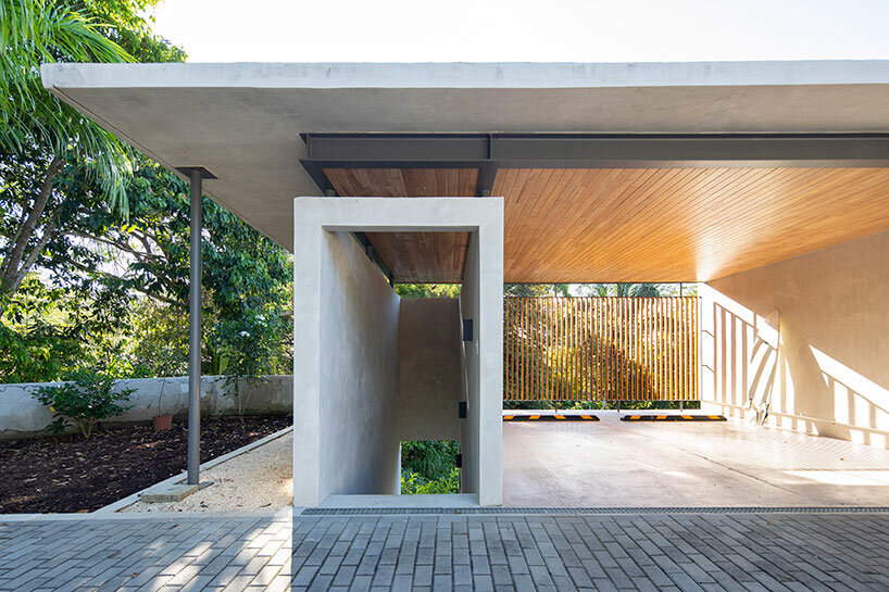 dubbed 'casa bell-lloc,' studio saxe's concrete dwelling is embedded into costa rican slope