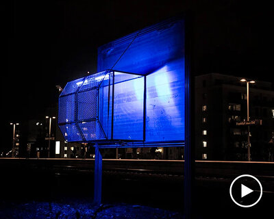 the billboard cage project by christos voutichtis questions the limits of architecture