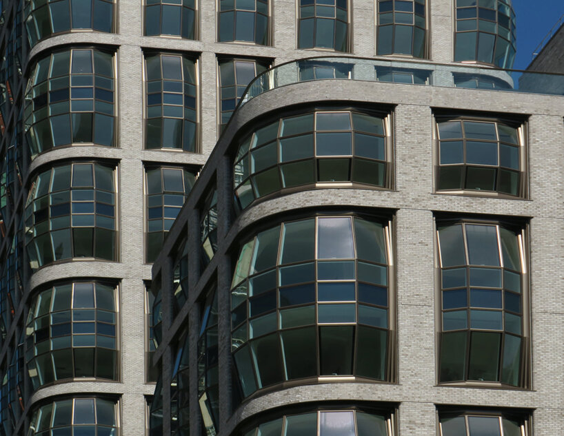 paul clemence captures heatherwick's 'lantern house' as it takes shape in new york city