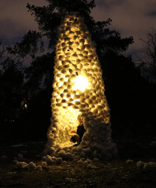 4000 snowballs build ulf mejergren architects' glowing cone-shaped hut in stockholm