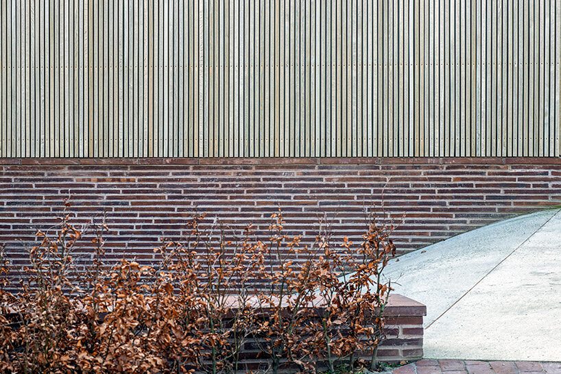 C.F. møller merges small brick-clad houses with gable roofs into 'villa E' in denmark