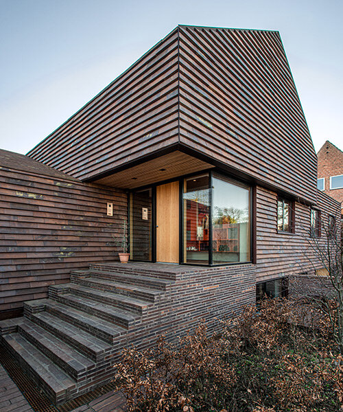 C.F. møller merges small brick-clad houses with gable roofs into 'villa E' in denmark