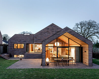 C.F. møller merges small brick-clad houses with gable roofs into 'villa E' in denmark