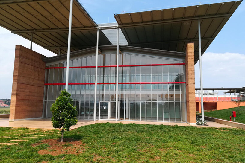 renzo piano completes children's hospital in uganda with rammed earth walls