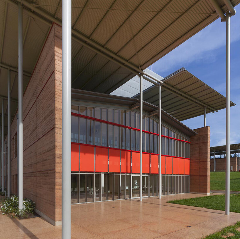 renzo piano completes children's hospital in uganda with rammed earth walls