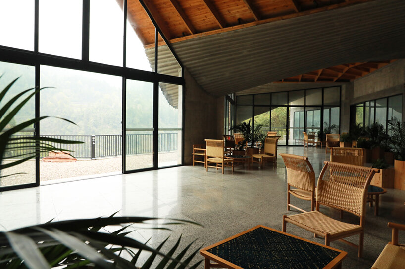 202 village guesthouses emerge from forested hunan as a group of mountainous peaks