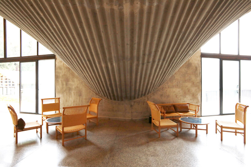 202 village guesthouses emerge from forested hunan as a group of mountainous peaks