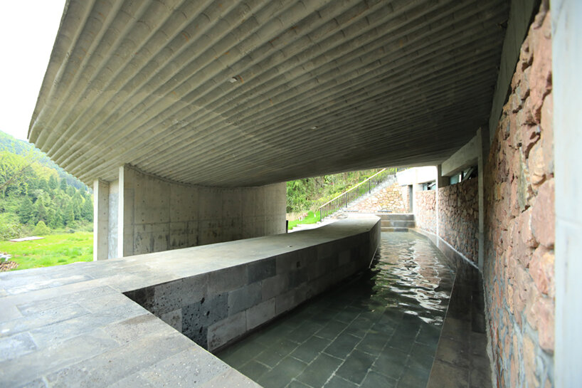 202 village guesthouses emerge from forested hunan as a group of mountainous peaks