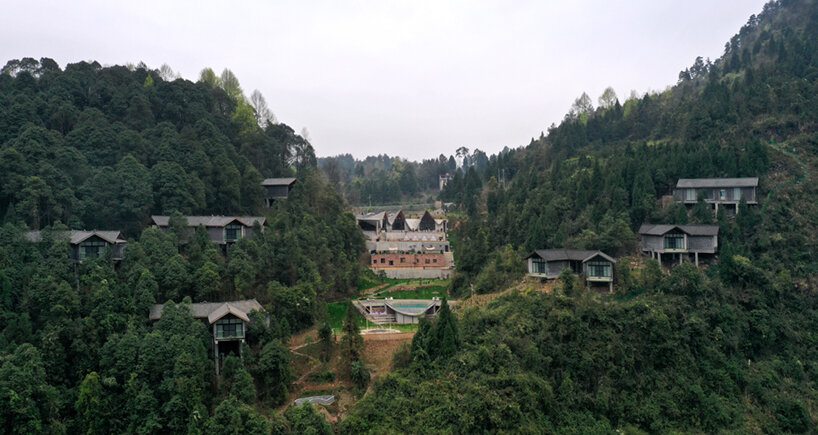 202 village guesthouses emerge from forested hunan as a group of mountainous peaks