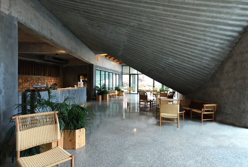 202 village guesthouses emerge from forested hunan as a group of mountainous peaks