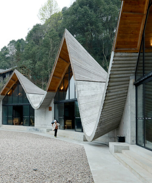 202 village guesthouses emerge from forested hunan as a group of mountainous peaks