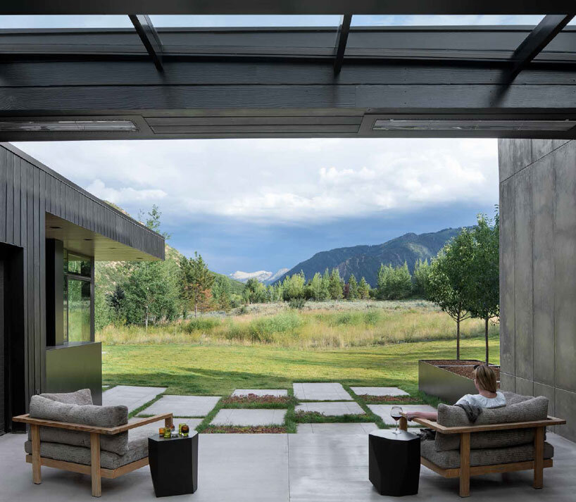 CCY architects embeds its meadow house into the rocky landscape outside aspen, colorado