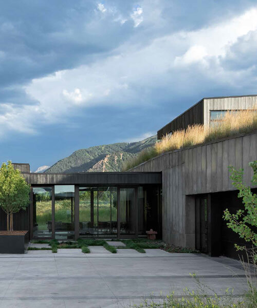 CCY architects embeds its meadow house into the rocky landscape outside aspen, colorado
