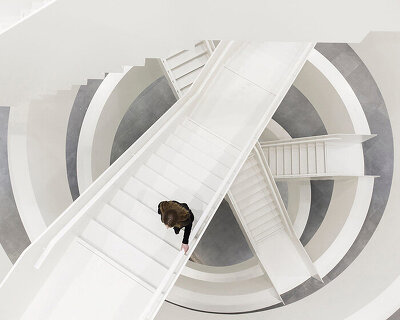 circular staircase spirals within the largest courthouse in the netherlands by KAAN