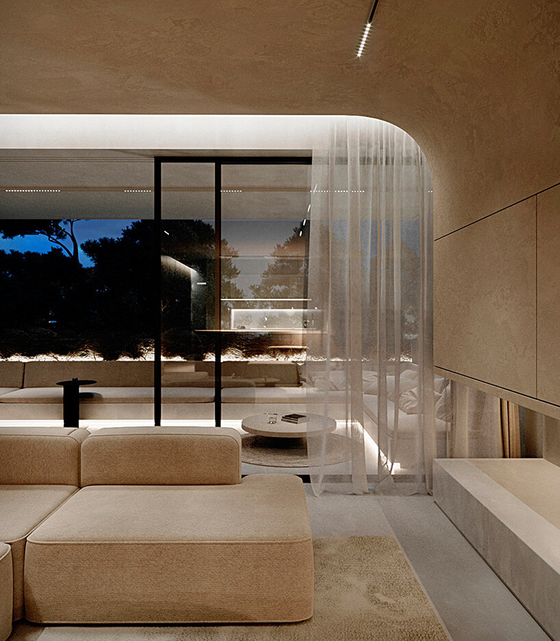 curved surfaces + warm tones give shape to residential interior in greece by kordas architects