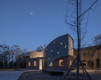 atelier xi's sculptural library emerges from ruins in old chinese village