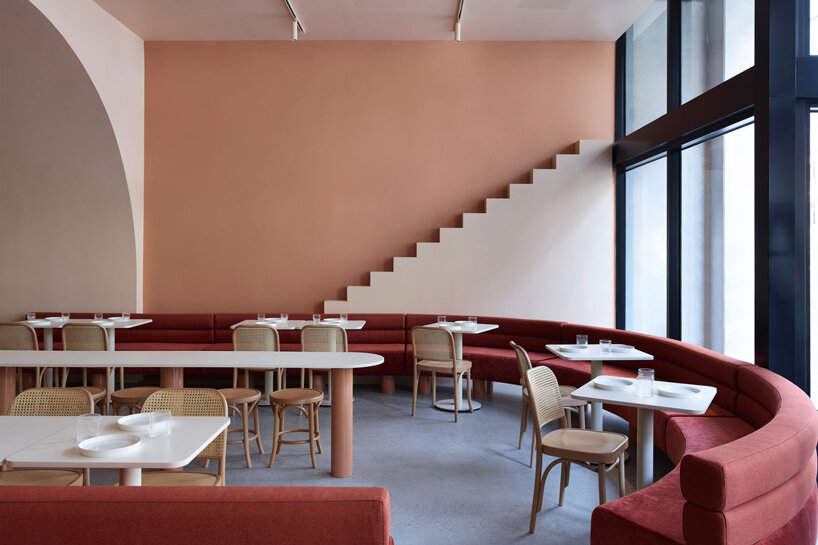 earthy hues take over this wes anderson inspired café in melbourne, australia