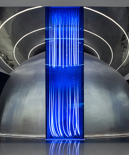 FISH-YU futuristic store interior reveals a silver planet illuminated with blue light in china