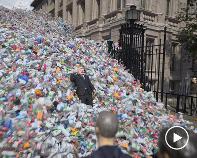 greenpeace film attacks the UK's plastic policy by drowning boris johnson in it