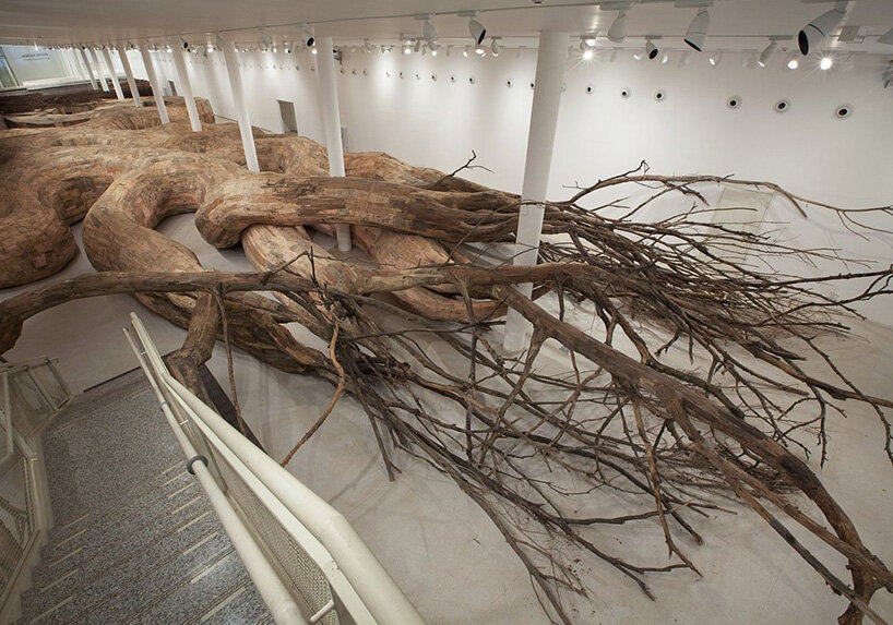 rooted in nature, henrique oliveira reflects on intervening in the fabric of reality