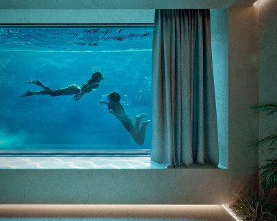 see-through pool casts rippling visuals in this greek residence by kordas architects