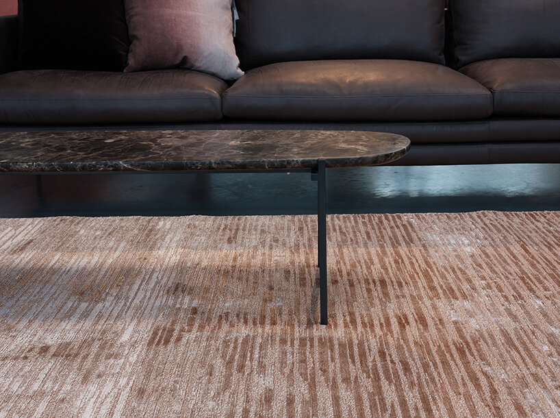 kymo hand-weaves banana-silk carpets inspired by melting point of metals