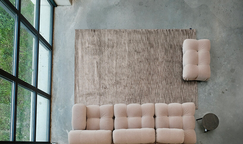 kymo hand-weaves banana-silk carpets inspired by melting point of metals
