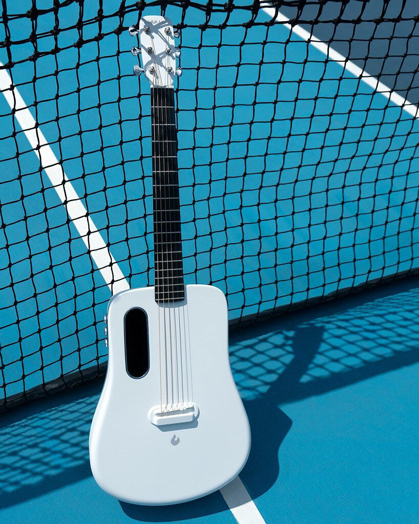 LAVA ME 2' is a weatherproof carbon fiber guitar with a built-in