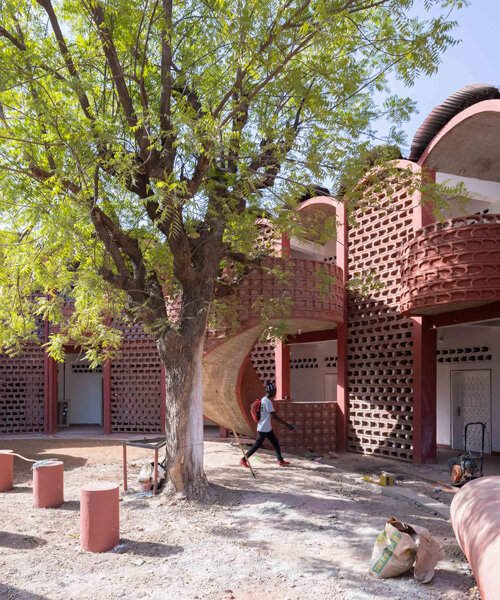 manuel herz works with local community in senegal to build hospital with lattice brickwork