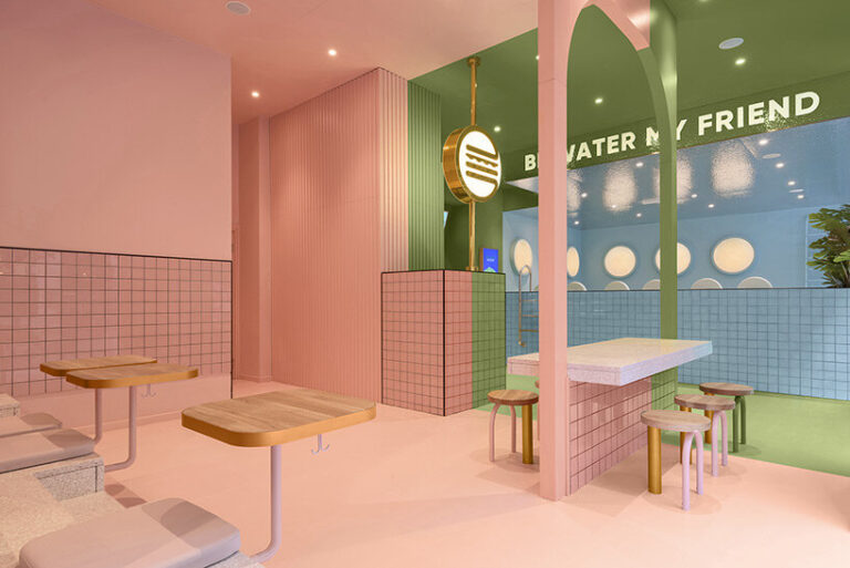 masquespacio forms swimming pool-like interior within hamburger ...