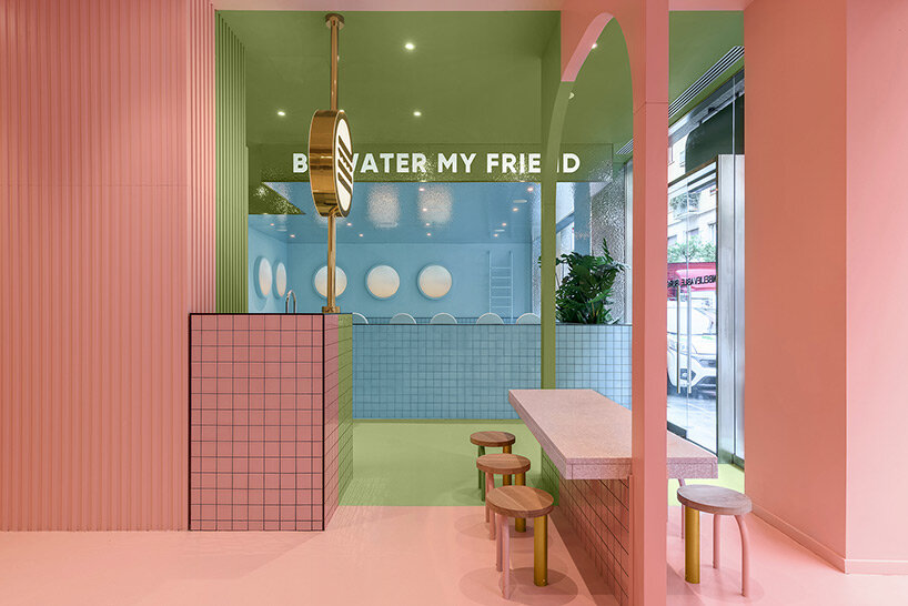 masquespacio forms swimming pool-like interior within hamburger restaurant in turin, italy