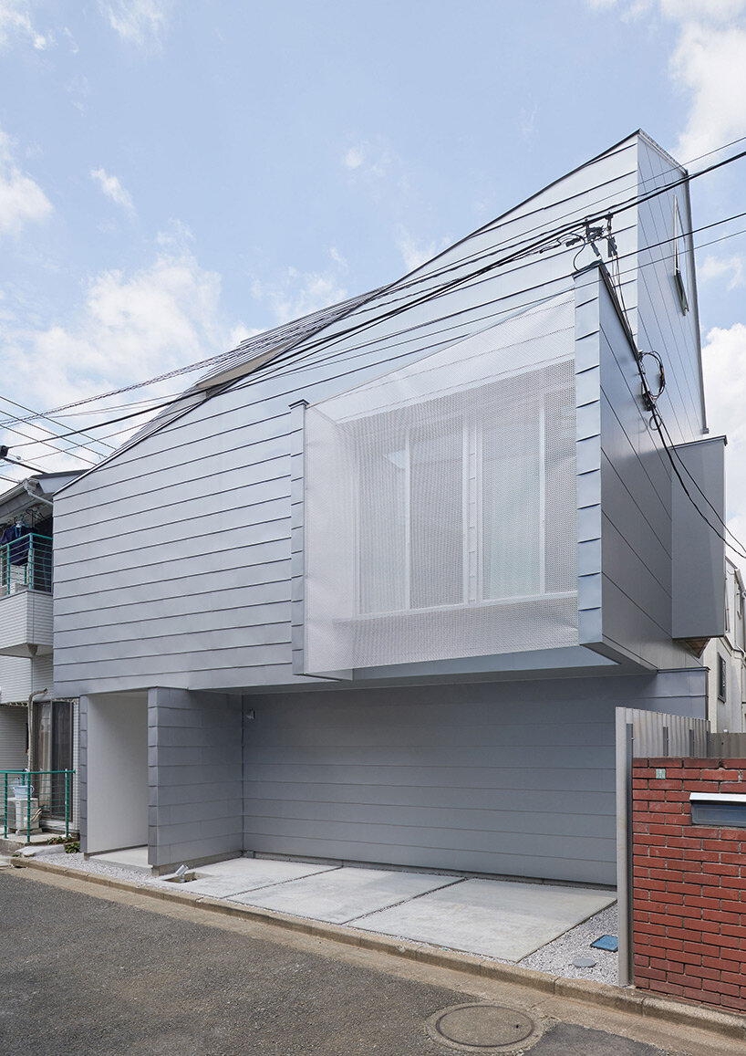 twisted diagonal volumes form GENETO house accommodating both humans ...