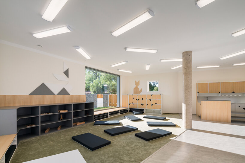 no architects' montessori kindergarten is a soft, playfully-designed volume