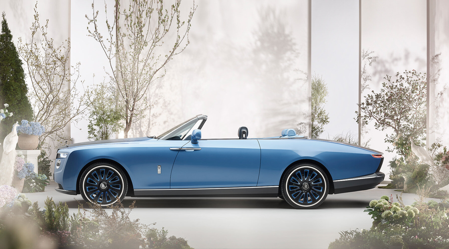 rolls-royce debuts pearl inspired 'boat tail' on the shores of