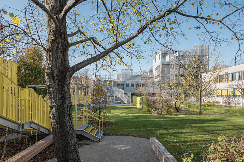 corrugated sheet clads a school extension in vienna by PPAG architects