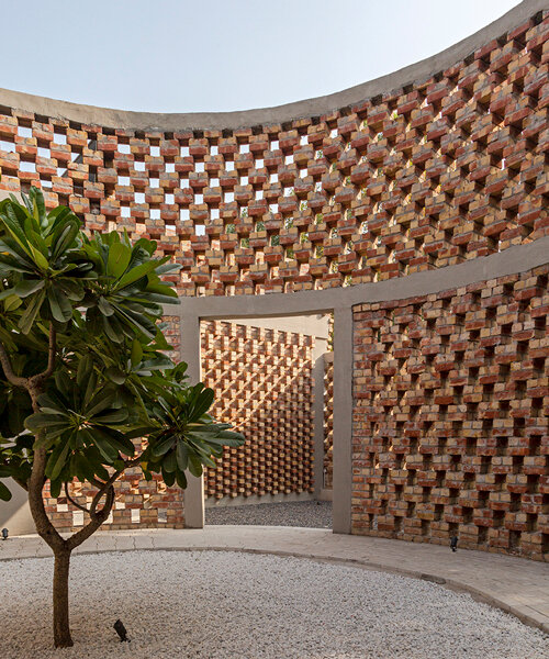brick perforations and projections characterize a house in new delhi designed by RLDA